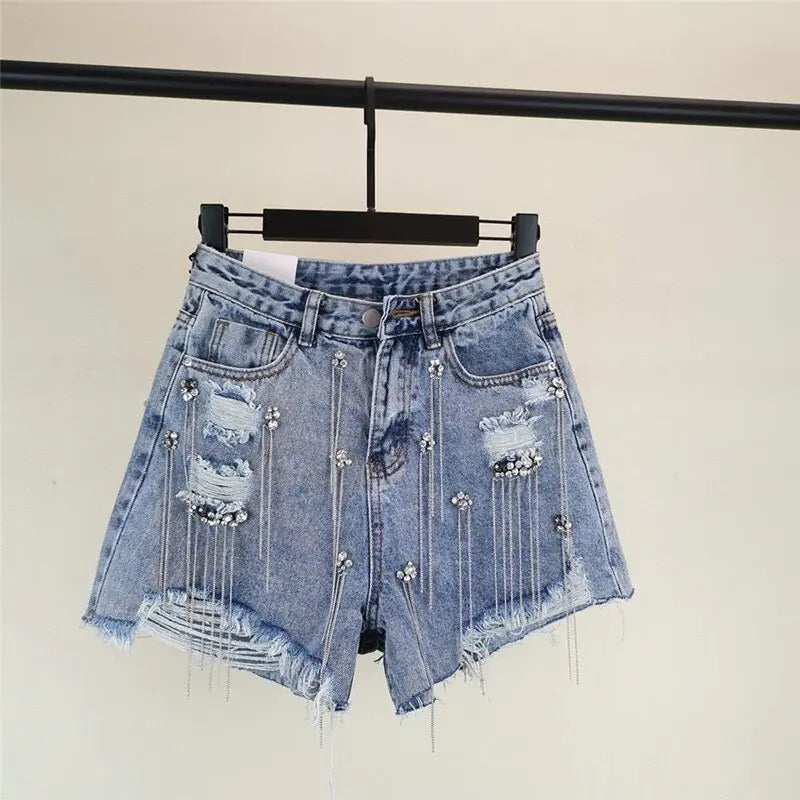 Shorts vaqueros con detalles de diamante y borlas - High Trend Coture